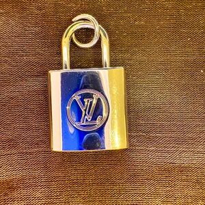 Gorgeous Silver Padlock with Louis Vuitton emblem front and back. New.